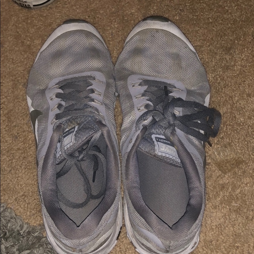 Grey Nike athletic shoes